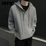 FOESCE IEFB Korean Style Men's Sweaters Casual Button Design Hooded Drawstring Round Neck Solid Color Knitting Male Loose Knits 9C8399